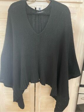 Do everything in love Black V-Neck Knit Poncho flattering!